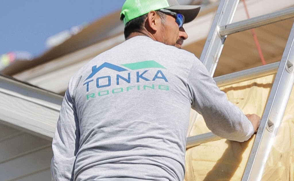 Tonka Roofing Company employee on ladder